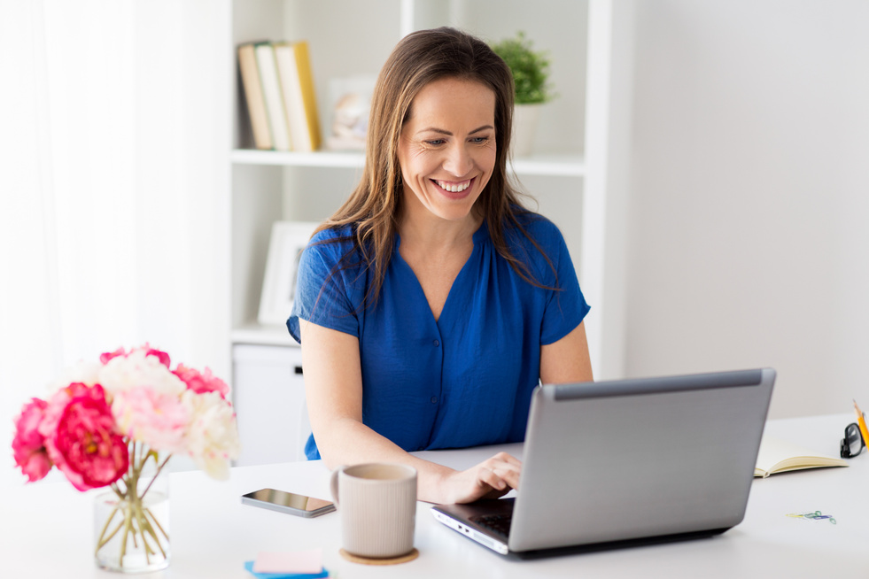 Happy Woman with Laptop 